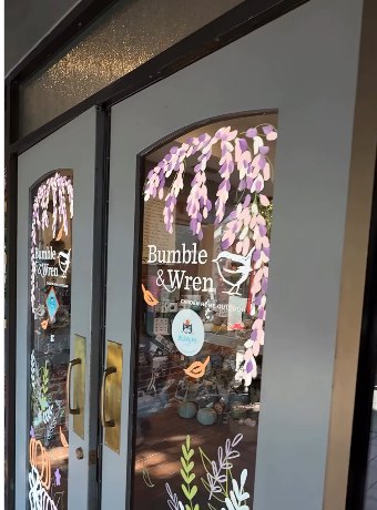 Fall wisteria and pumpkin paintings on the doors at Bumble & Wren by Katie Paige Art Co