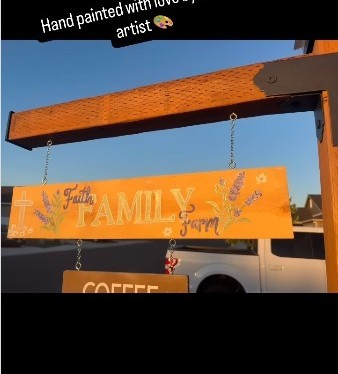 Faith Family Farm hanging sign painted by Katie Paige Art Co